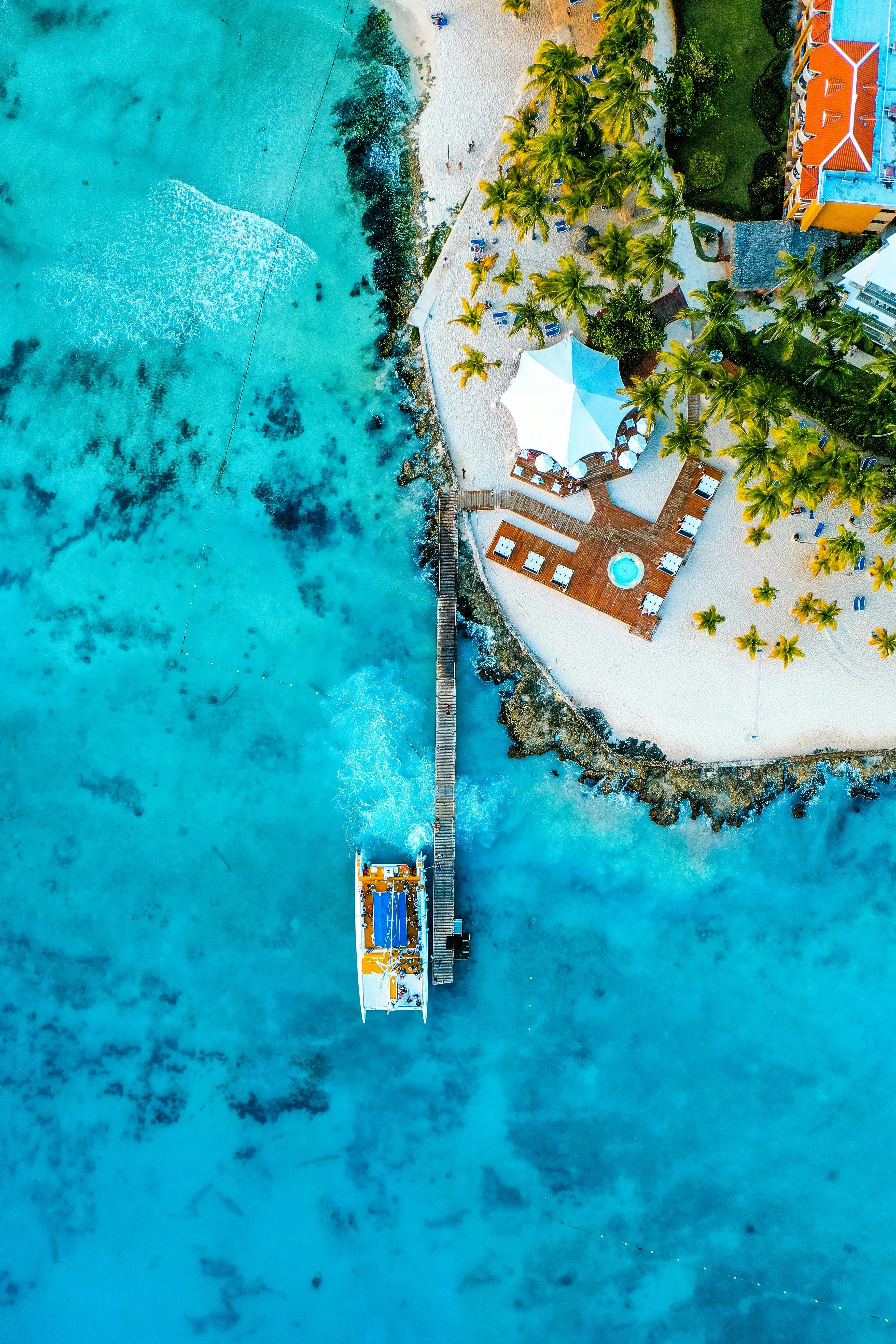 Aerial view of a pier over turquoise water at Dominicus, Bayahibe