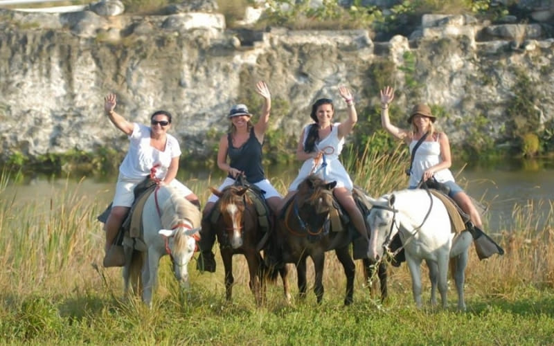 Horseback riding along the coast